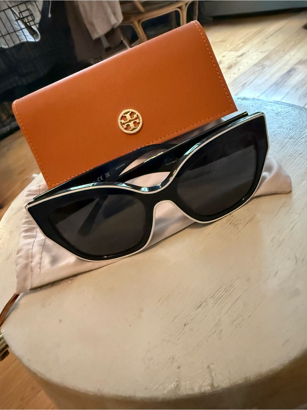Tory Burch Black Cat-Eye Sunglasses with Orange Logo Case